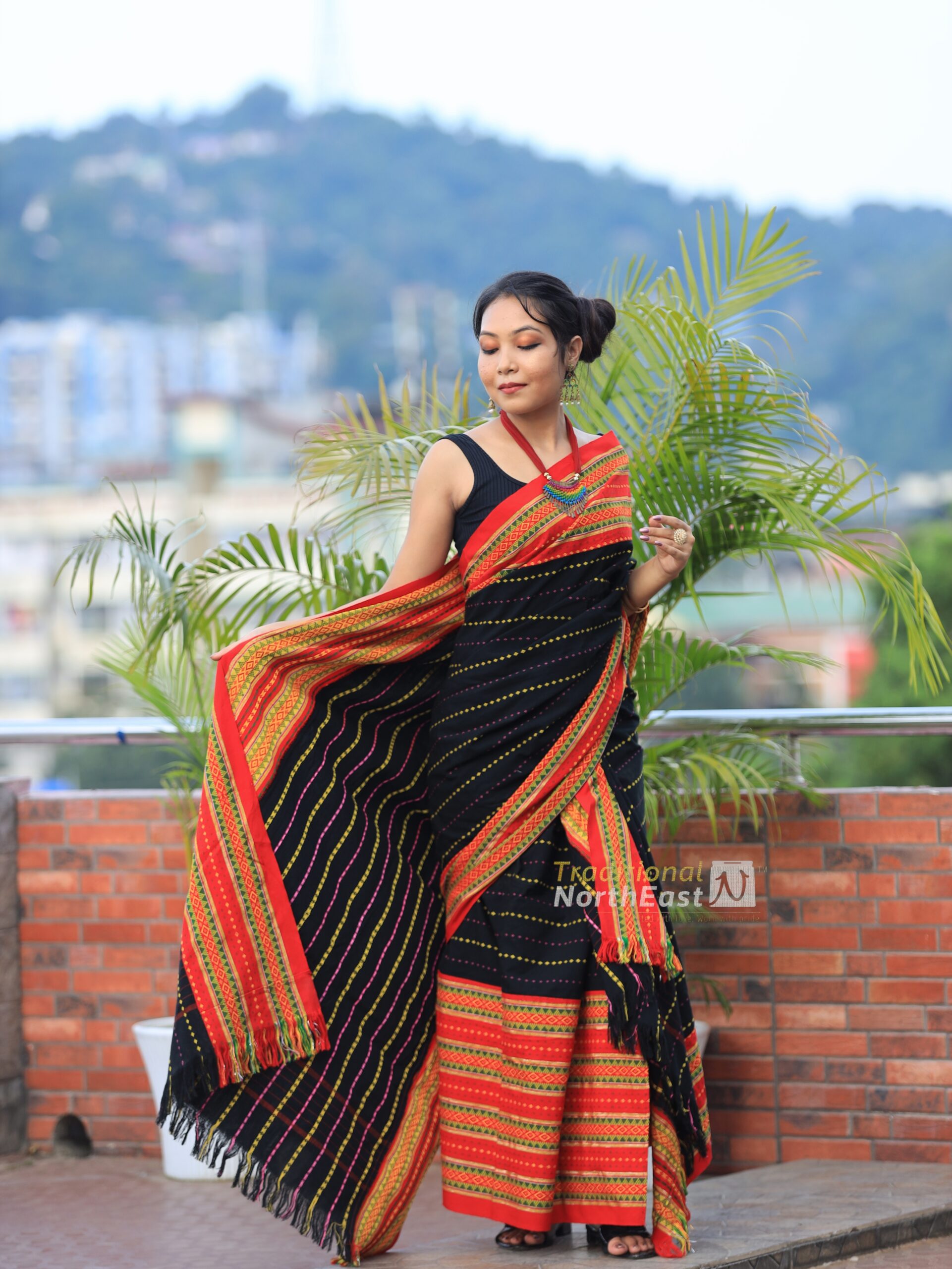 Agartala: Indigenous people wearing traditional folk dresses walk during a  'Heritage Walk' #Gallery